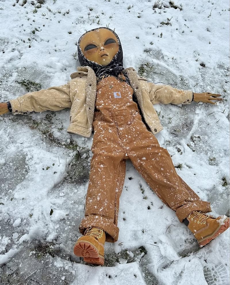 Lil Mayo making a snow angel