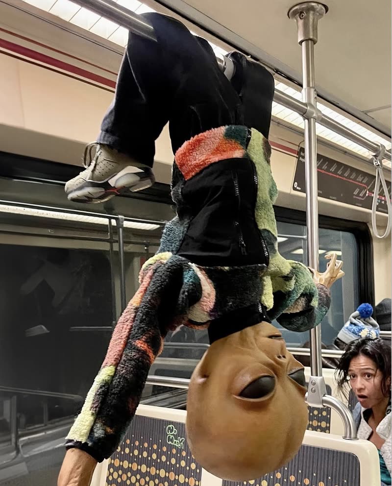 Lil Mayo hanging upside down on the subway